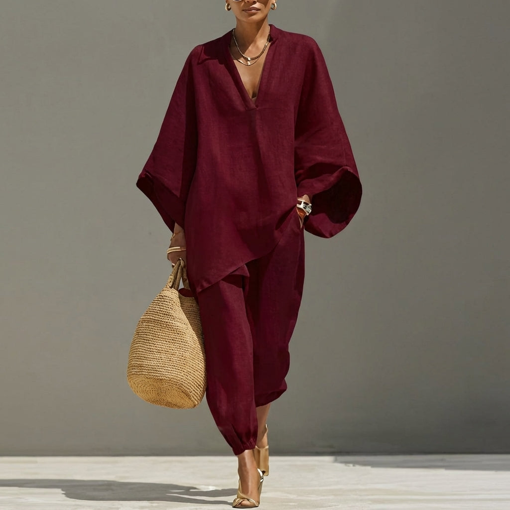Elegant women's casual set: a comfortable relaxed tunic top paired with matching tapered pants.