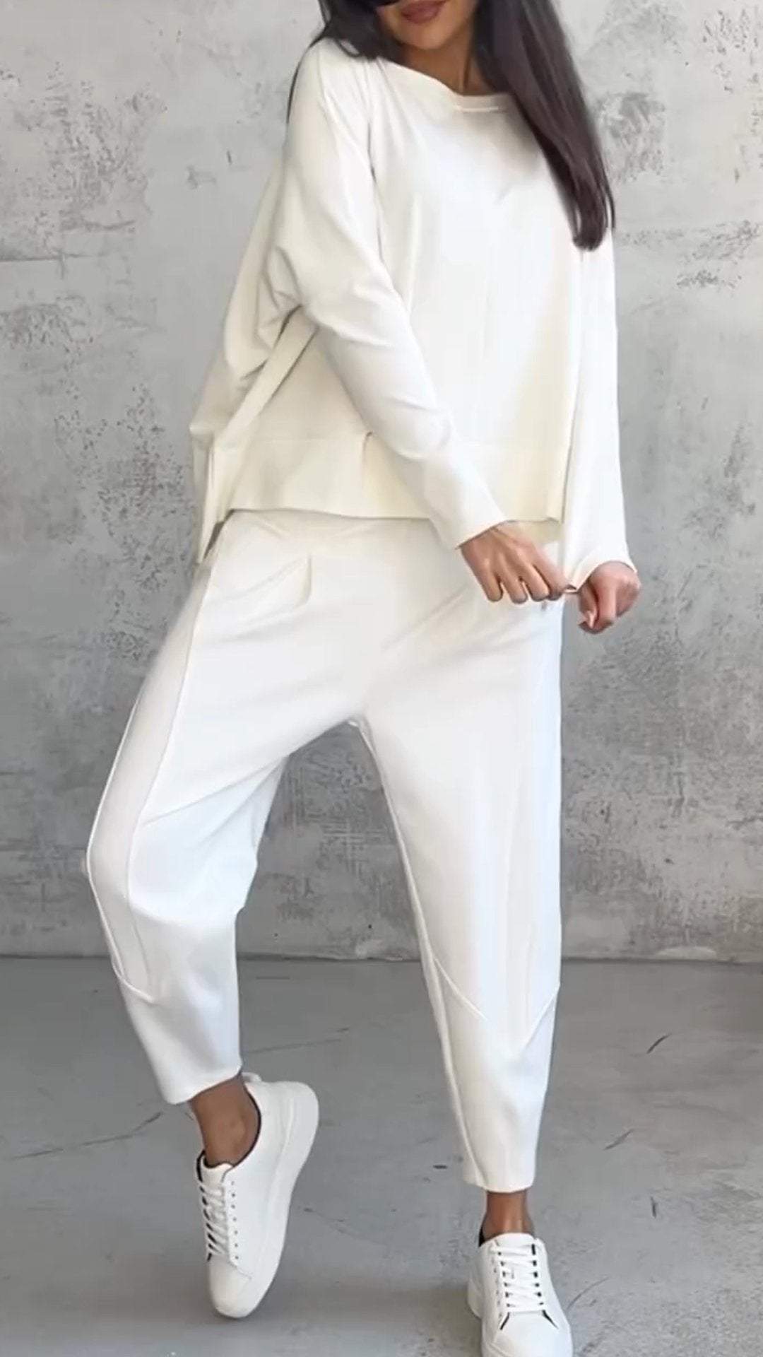 Women's relaxed fit two-piece loungewear set in soft fabric, ideal for comfortable everyday style.