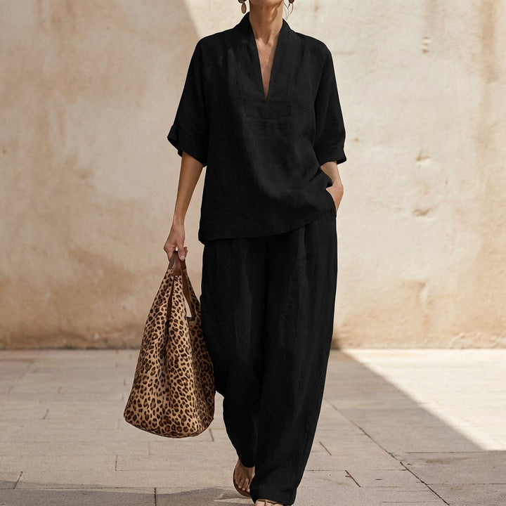 Stylish women's matching set with a flattering V-neck top and chic wide-leg pants for a relaxed, modern look.