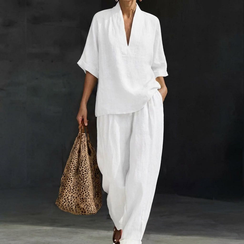 Women's two-piece outfit: relaxed V-neck top paired with comfortable wide-leg pants. Effortless matching set.