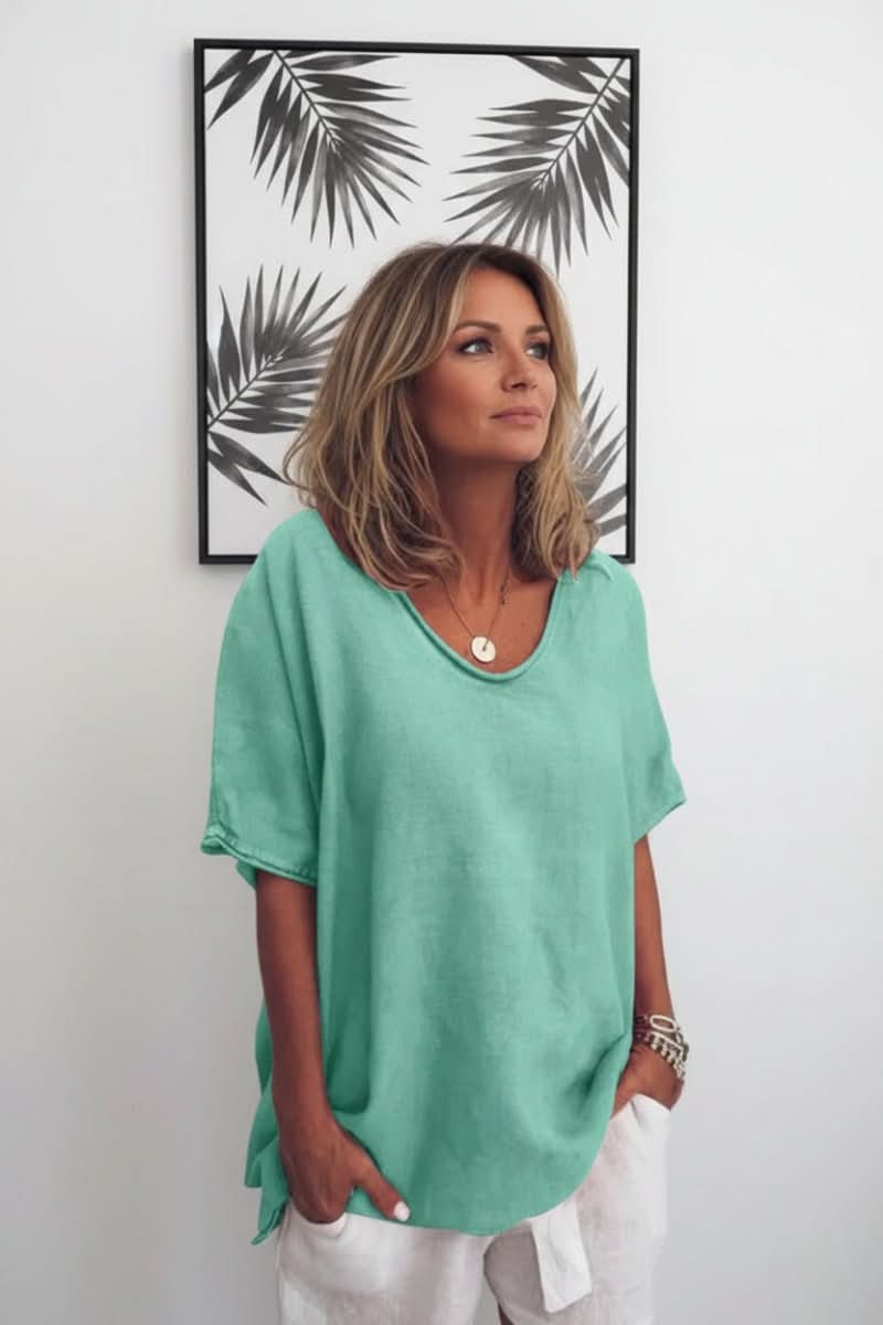 Women's summer V-neck blouse, relaxed fit, airy & comfortable for casual outfits.