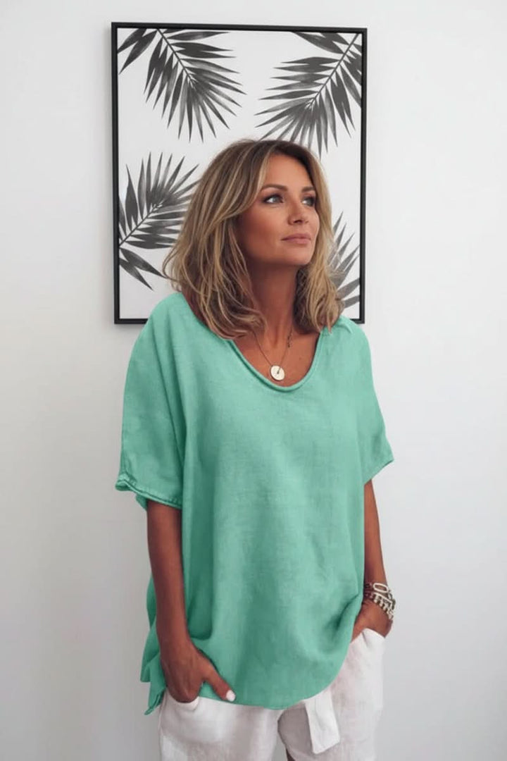 Women's summer V-neck blouse, relaxed fit, airy & comfortable for casual outfits.