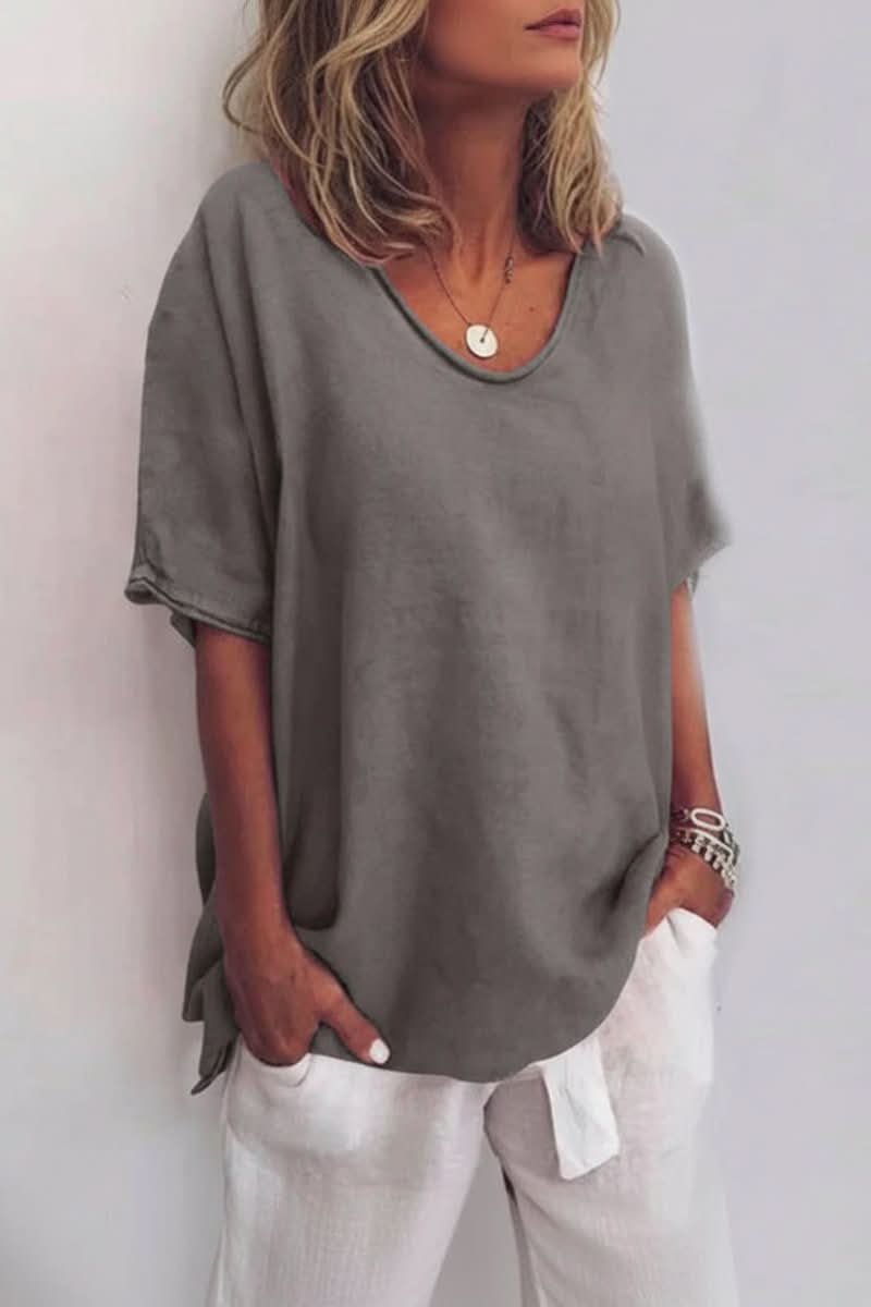 Relaxed fit V-neck blouse for women, a comfortable and airy summer top for casual styling.