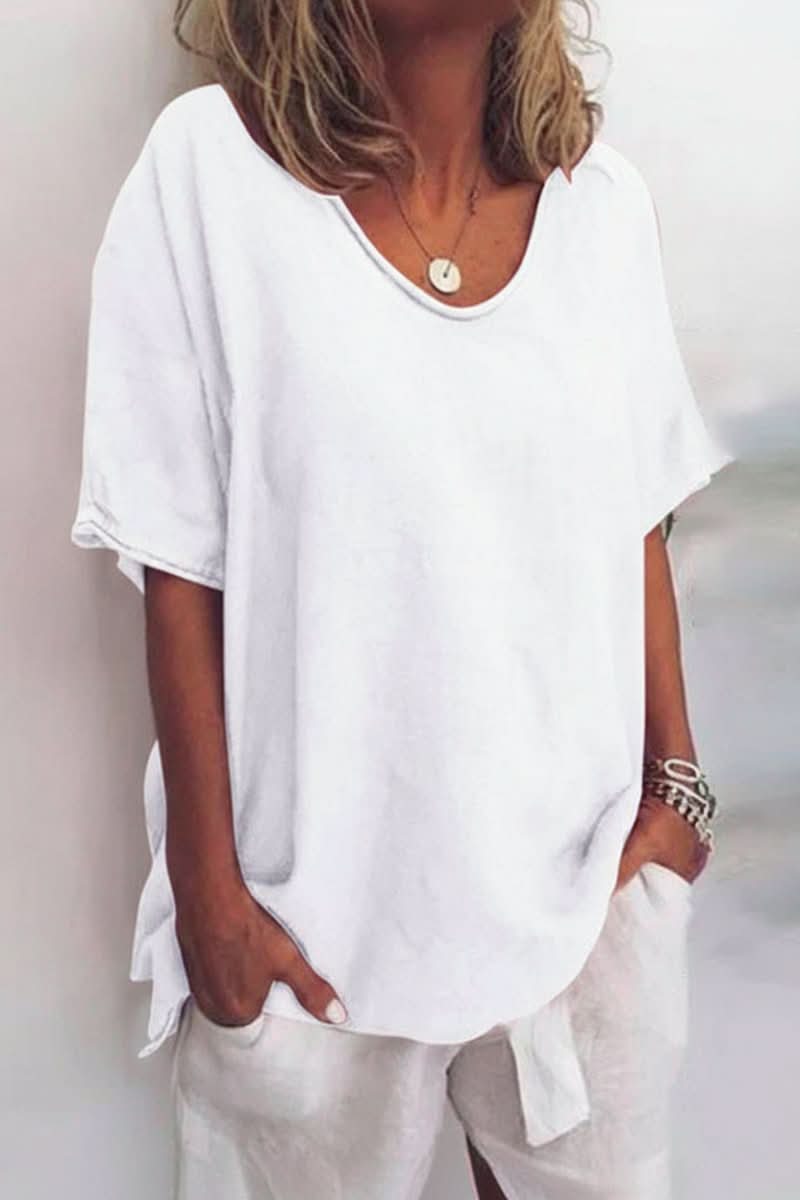 Wear this women's relaxed fit V-neck blouse for ultimate summer comfort & stylish casual outfits.