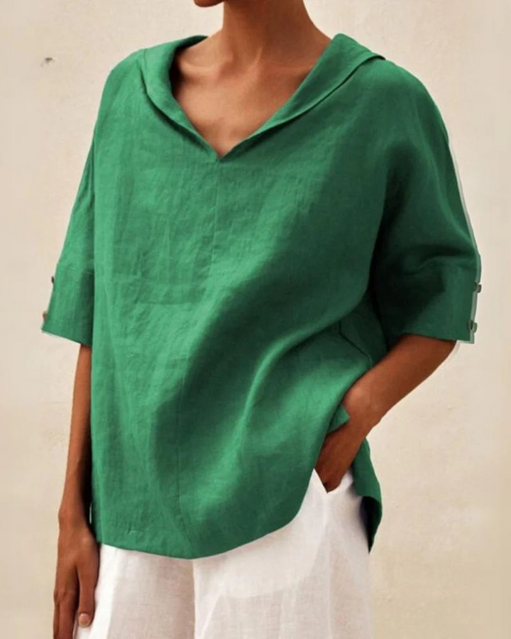 Women's relaxed fit V-neck blouse, short sleeve for effortless everyday comfort. Casual & versatile spring/summer top.