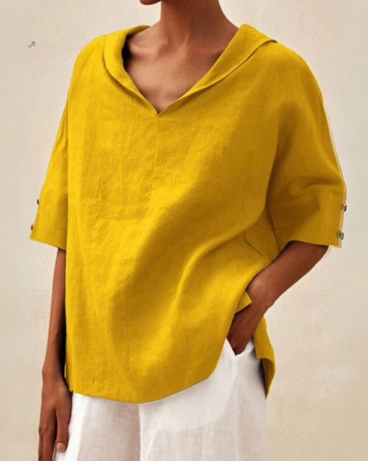 Stylish women's V-neck blouse with short sleeves & relaxed fit. Perfect casual wear for spring & summer comfort.