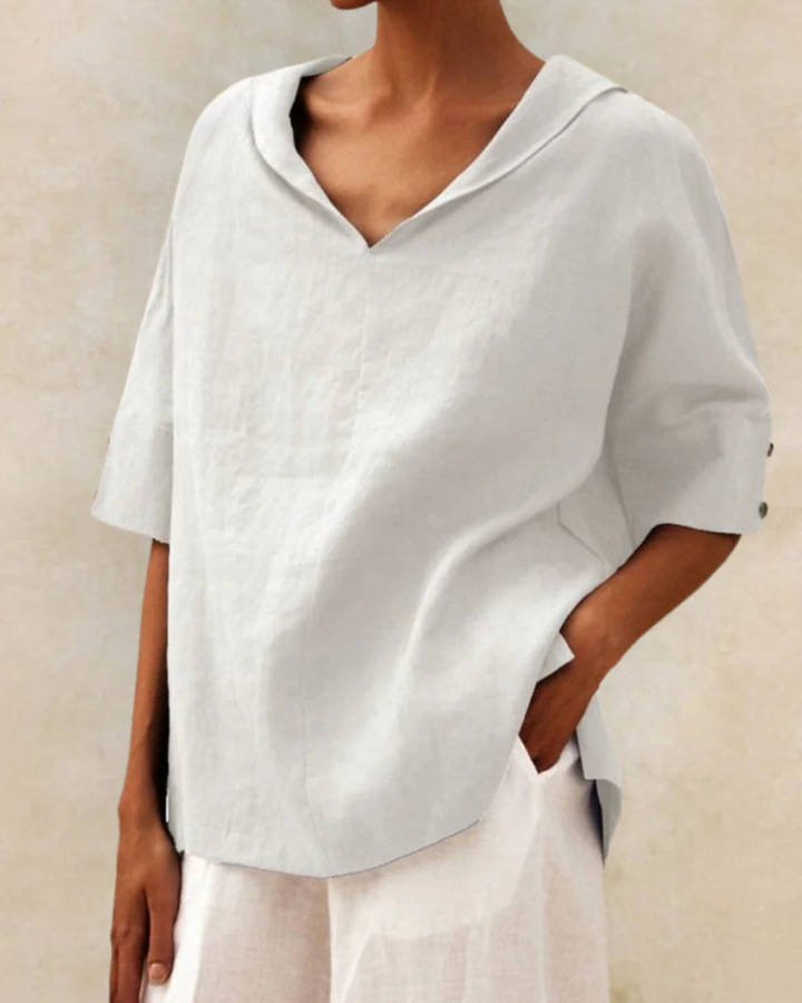 Easy wear women's V-neck blouse. Relaxed fit, short sleeve top for everyday comfort & versatile spring/summer style.