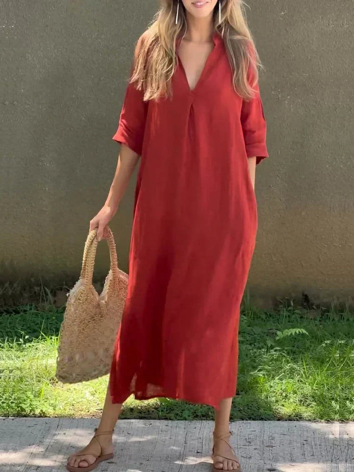 Women's casual V-neck maxi dress in a relaxed fit, featuring a side slit for easy movement.