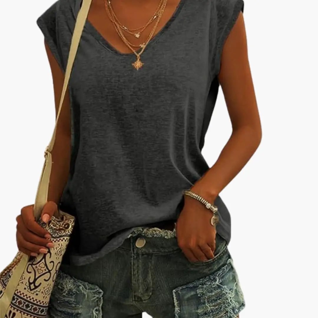Comfortable sleeveless V-neck top for women, featuring a relaxed fit, great for summer style & travel.