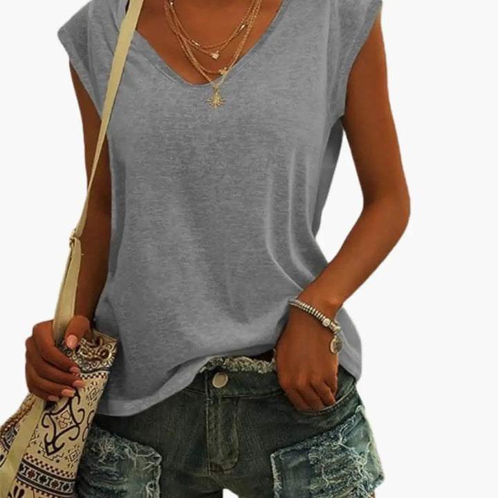 Soft women's relaxed fit V-neck sleeveless top, an essential layering piece for all-day comfort.