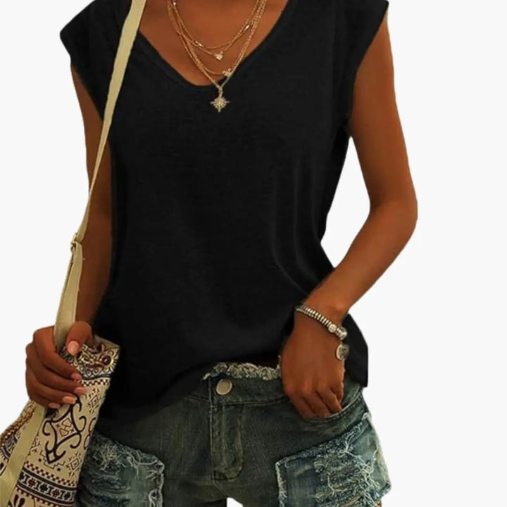 Versatile women's V-neck sleeveless top with a relaxed fit, a comfortable travel essential for any wardrobe.