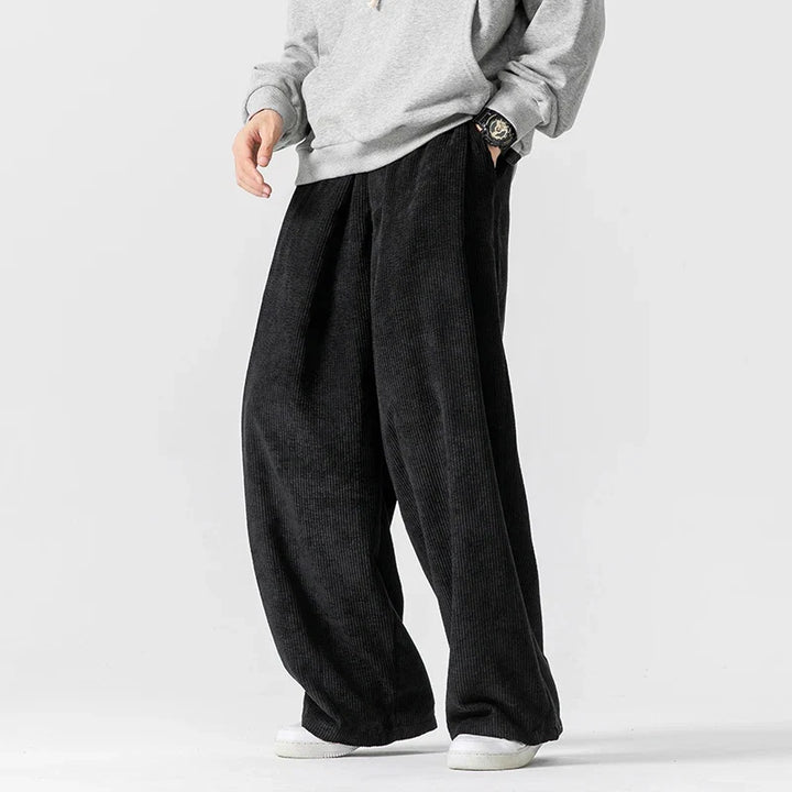 Comfy women's relaxed fit wide leg trousers with drawstring waist. Ideal for casual or everyday wear.