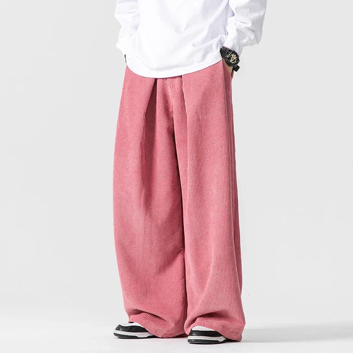 Relaxed fit women's wide leg trousers featuring a comfy drawstring waist. Multi-pocket design, stylish.