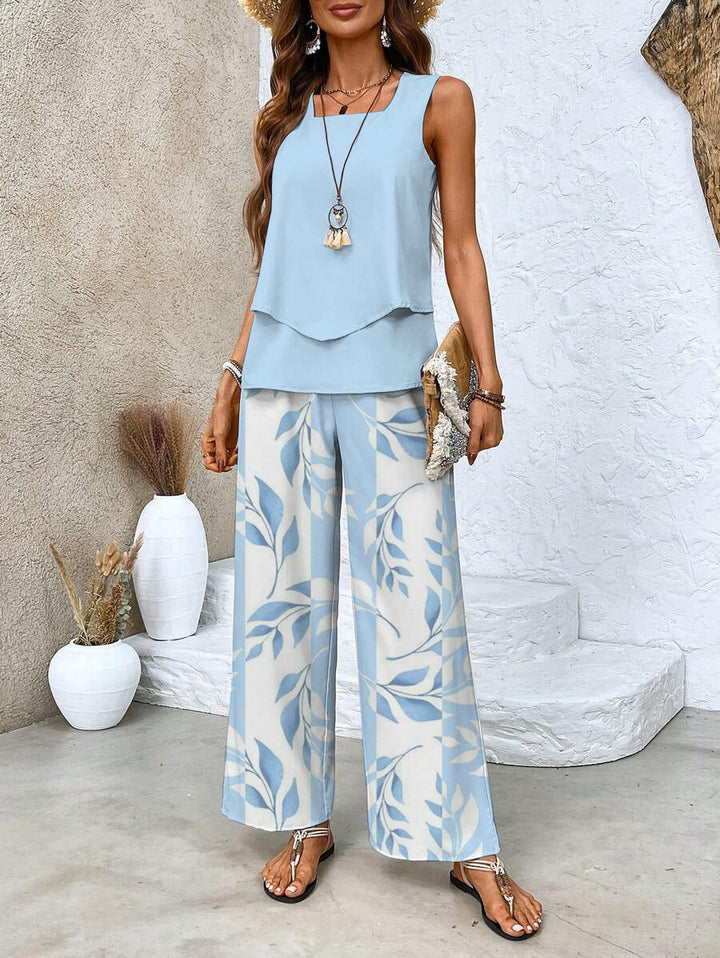 Women's relaxed flowy pants & tank top matching set. Comfortable two-piece wide-leg summer casual outfit.