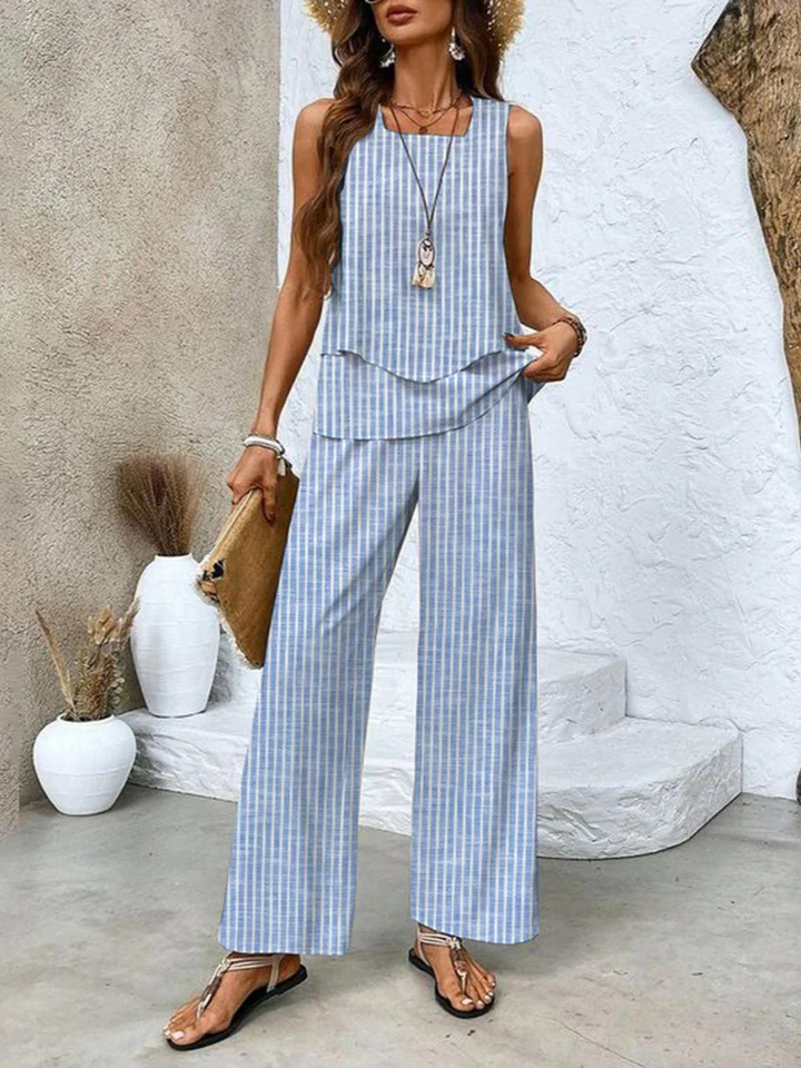 Women's relaxed fit tank top and flowy wide-leg pants matching set. Ideal for comfortable, versatile daily wear.