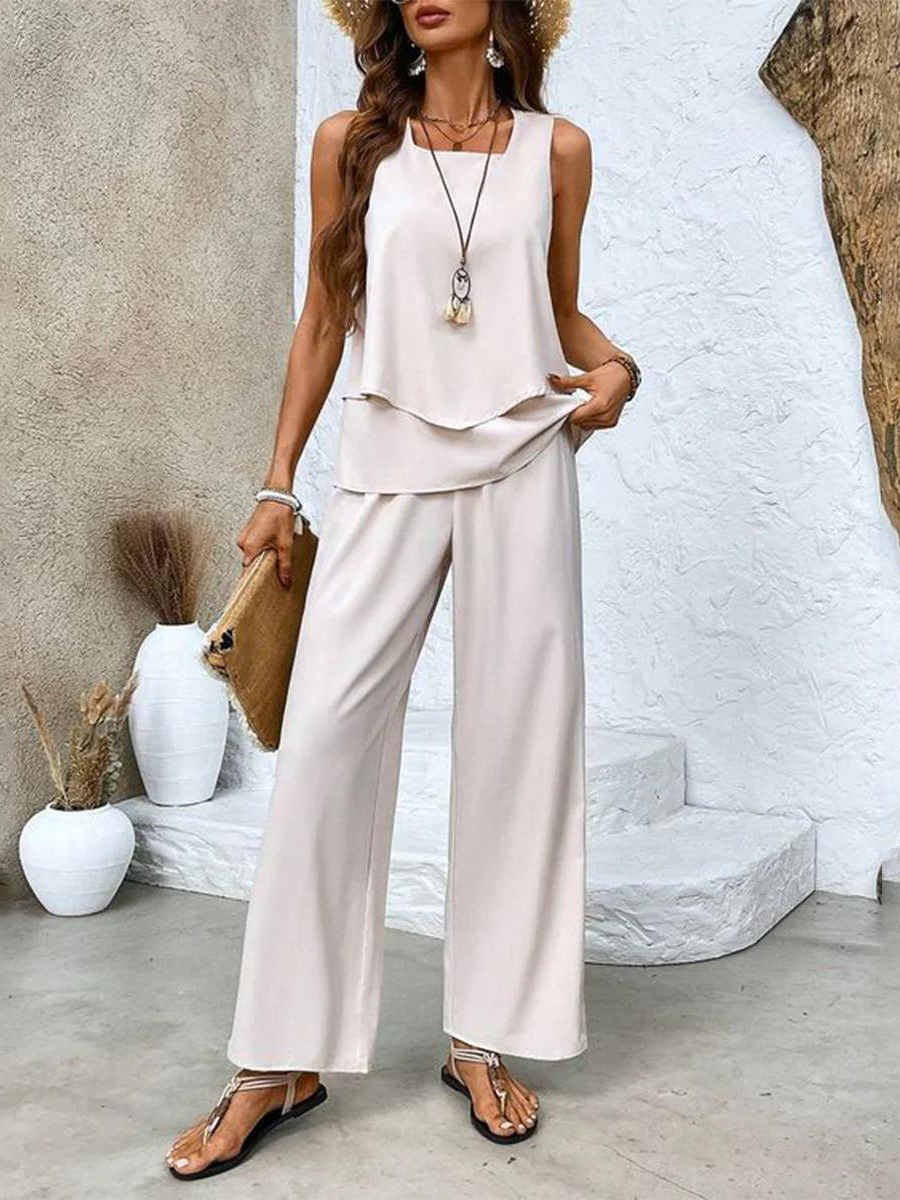 Soft, comfortable women's two-piece set with a relaxed tank top and flowy wide-leg pants for casual summer style.