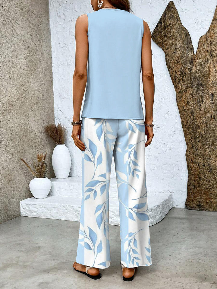 Elegant women's matching set: a relaxed tank top & flowy wide-leg pants, ideal for comfortable summer fashion.