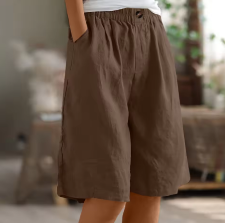 Comfortable women's shorts: relaxed fit, high-waisted Bermuda style, essential for summer.