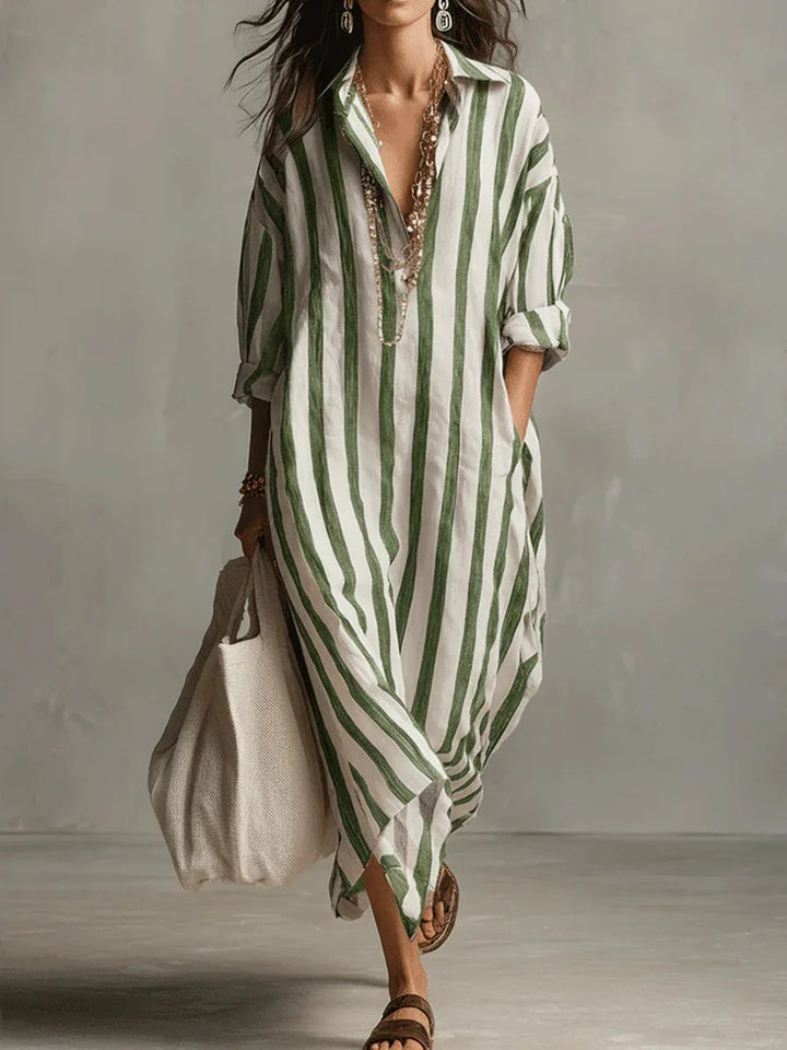 Stylish women's striped maxi shirt dress with V-neck, relaxed fit, & easy-care fabric. Essential summer style.