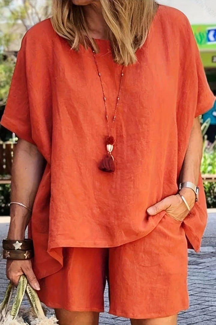 Comfortable & stylish women's two-piece leisure set for summer. Relaxed fit shorts & top.