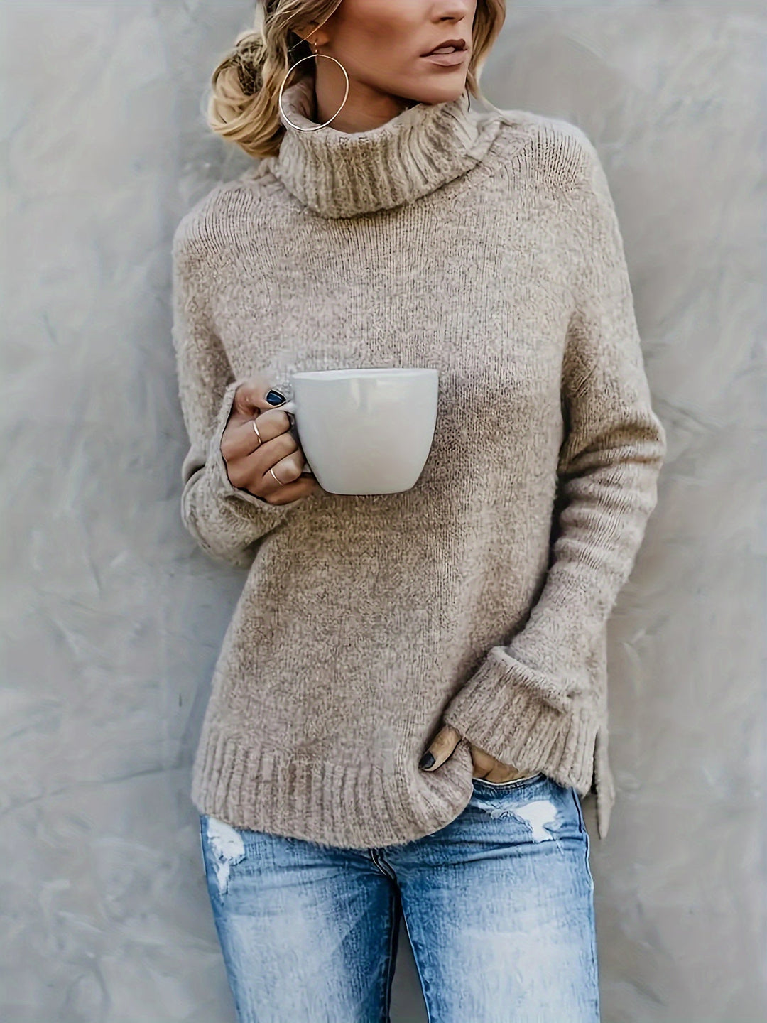 Women's relaxed turtleneck sweater with stylish side split hem, perfect for casual fall fashion.