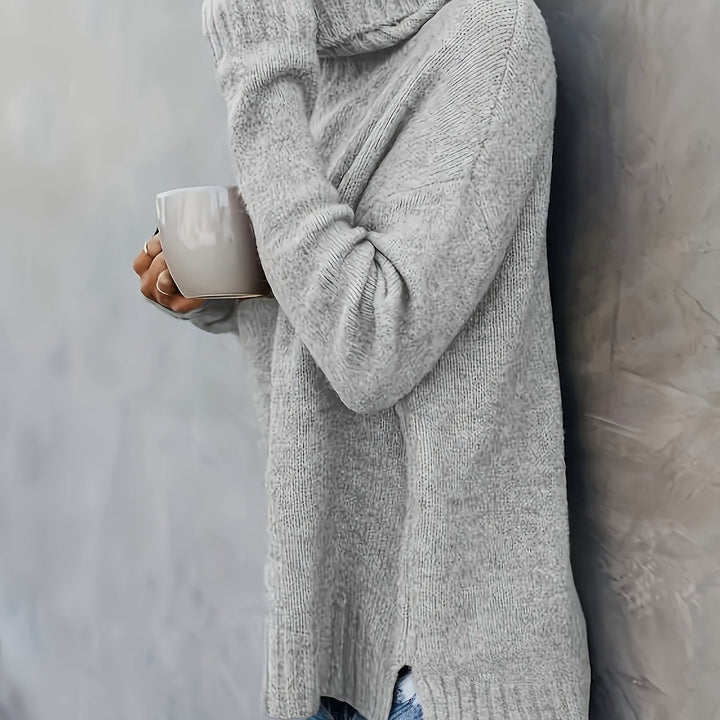 Women's everyday casual wear: soft relaxed turtleneck sweater with a contemporary side split hem.