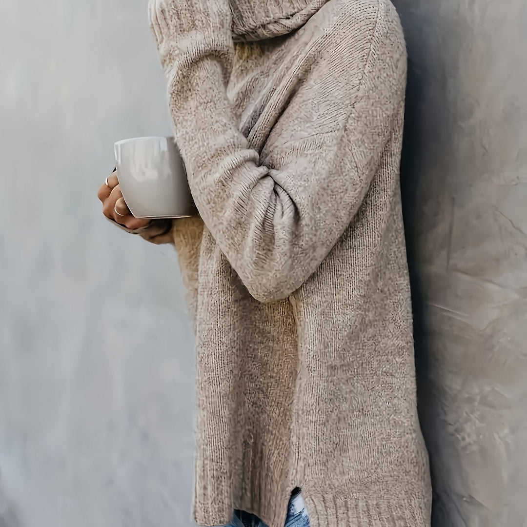 Chic women's relaxed fit sweater, a cozy turtleneck with stylish side split hem for ultimate comfort.