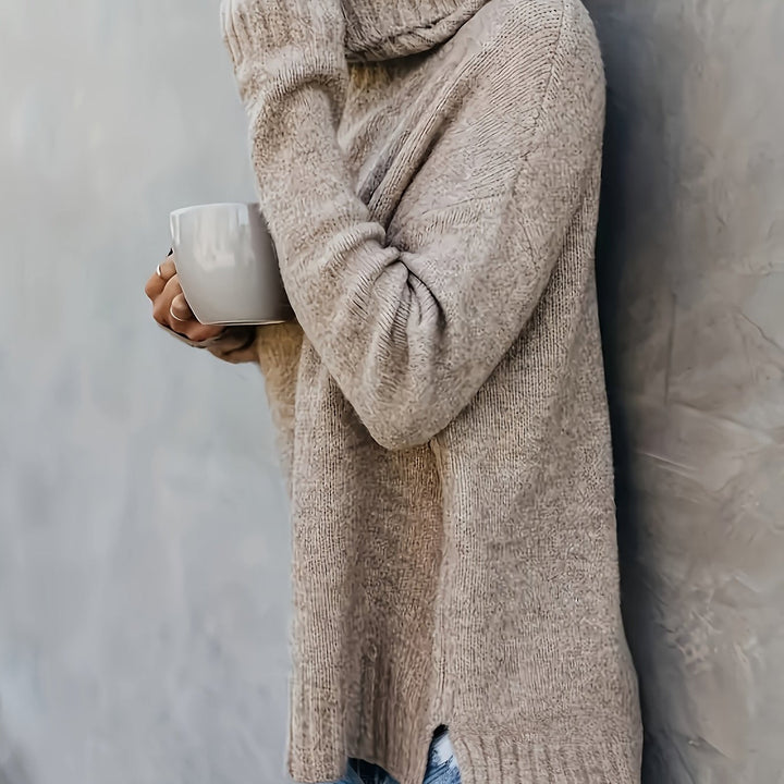 Chic women's relaxed fit sweater, a cozy turtleneck with stylish side split hem for ultimate comfort.