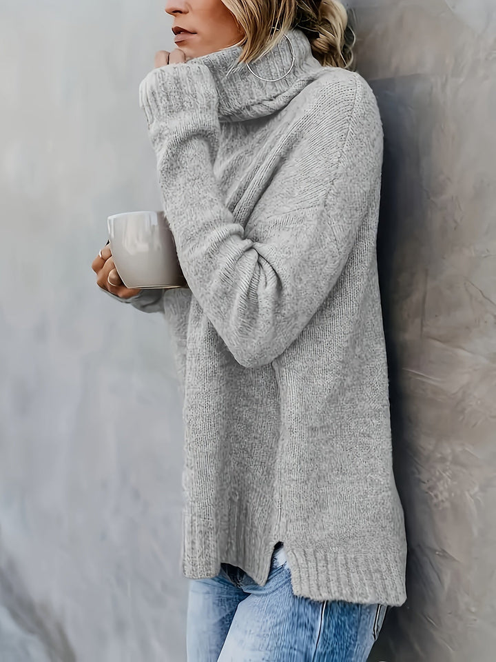 Fashionable women's turtleneck top featuring a chic side split hem, a versatile casual sweater.