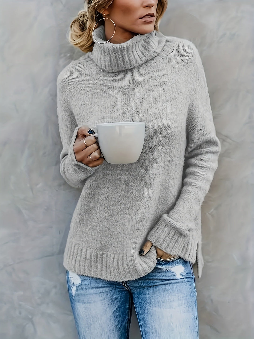 Elegant women's long sleeve relaxed fit turtleneck, featuring a subtle side split hem for comfort.
