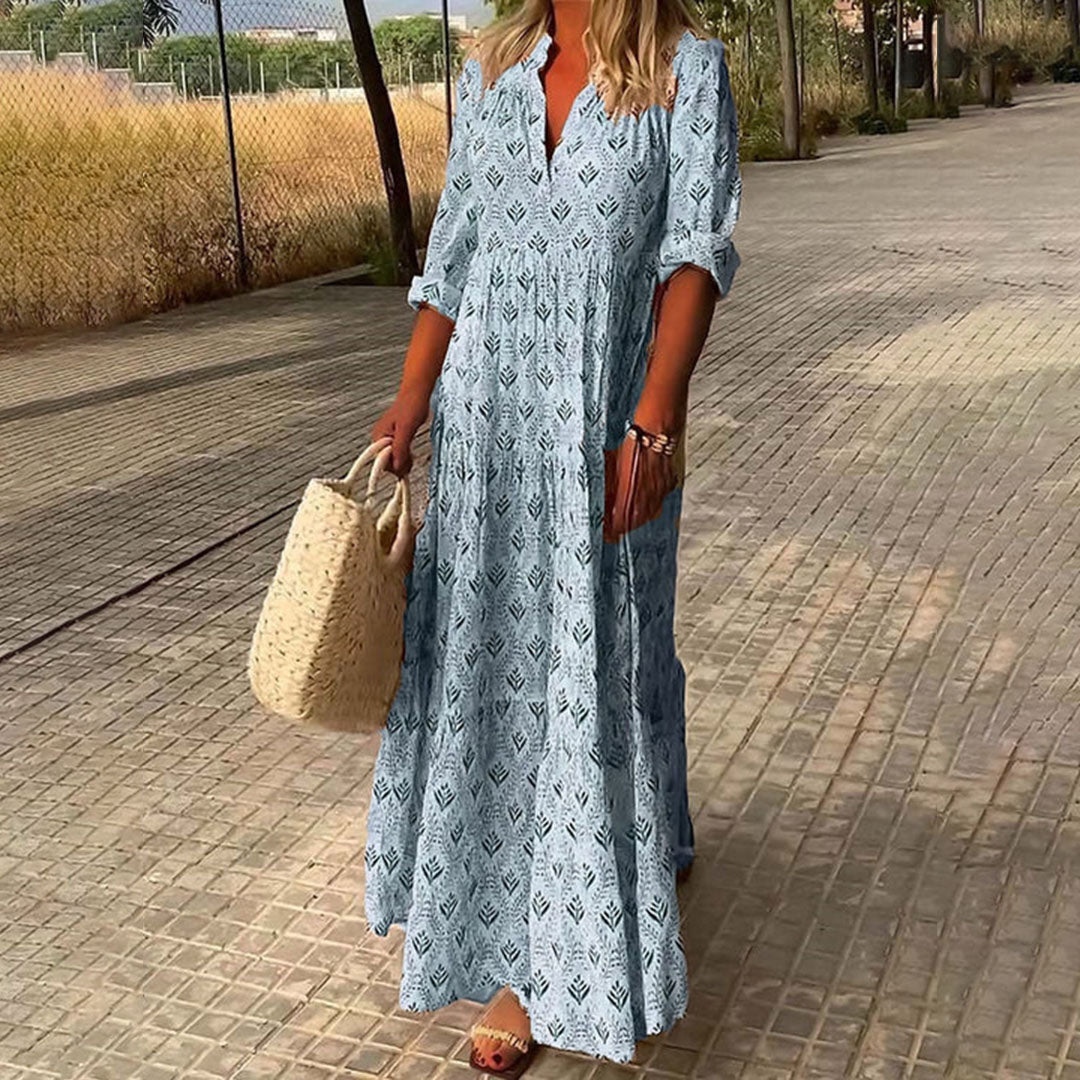 Boho print maxi dress for women featuring a relaxed V-neck and stylish roll-up sleeves for versatile fashion.