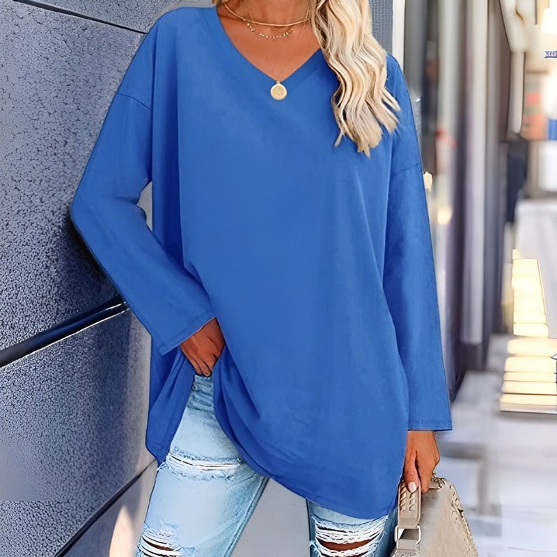 Close-up of soft fabric on a women's relaxed V-neck comfort shirt, highlighting quality for everyday wear.