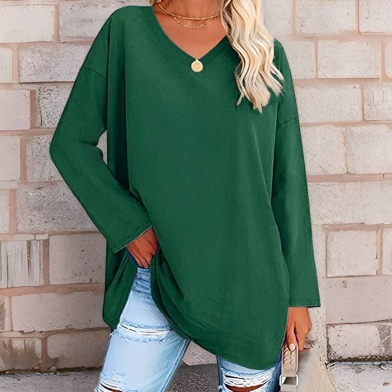 Versatile women's V-neck top layered for spring/fall style, offering relaxed everyday comfort apparel.