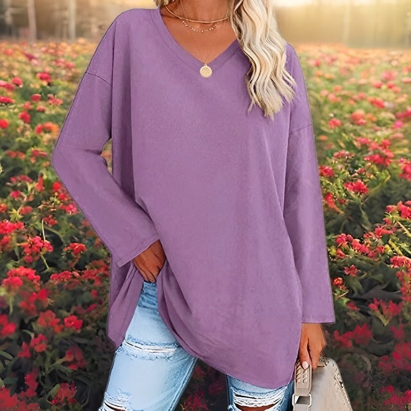 Back view of women's relaxed fit V-neck shirt, showing comfortable drape for casual everyday wear.