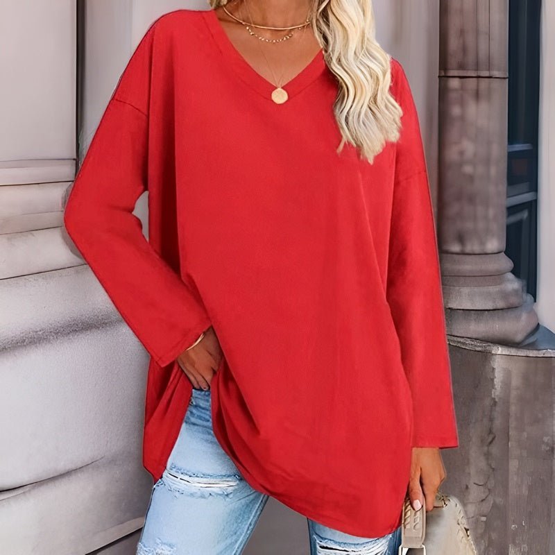 Detail shot of the V-neckline on a women's relaxed comfort shirt, emphasizing stylish everyday design.