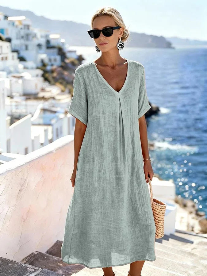 Soft fabric V-neck midi dress, women's relaxed fit with short sleeves, comfortable for everyday wear.