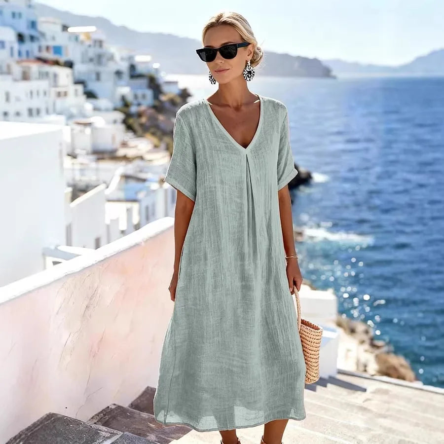 Lightweight spring/summer V-neck midi dress, women's relaxed fit with short sleeves.