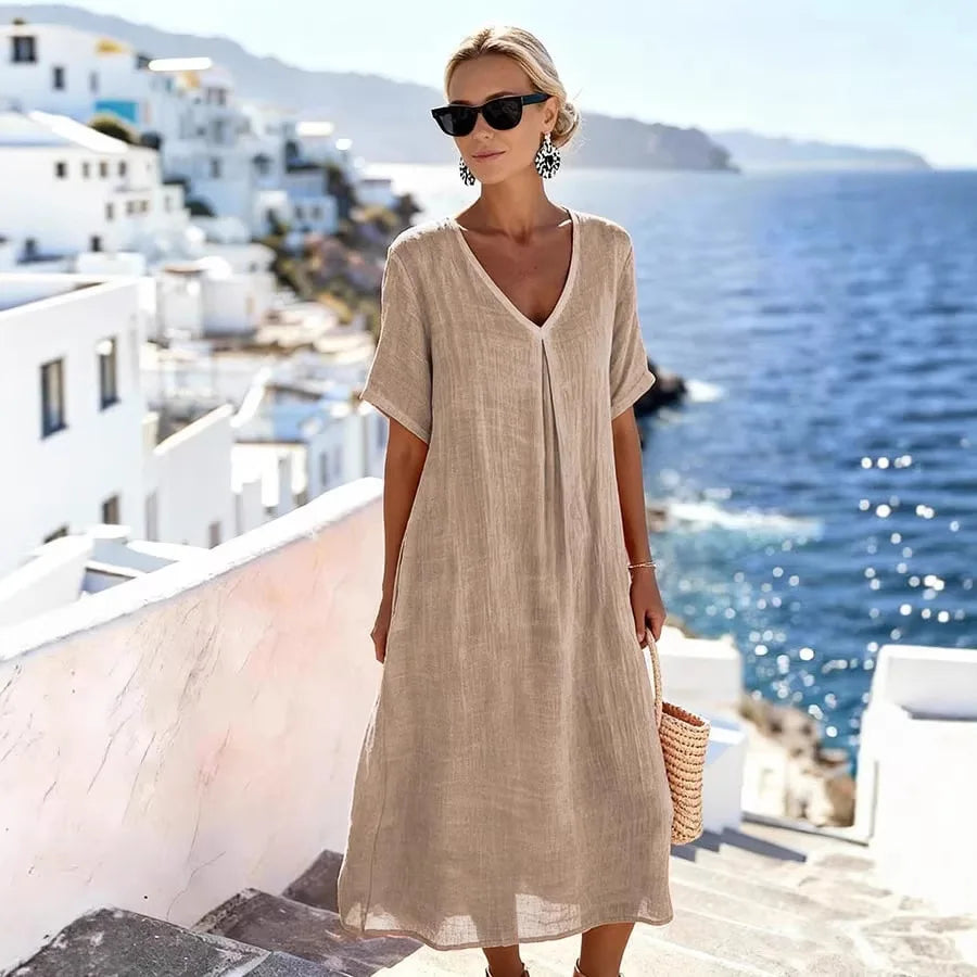 Versatile women's V-neck midi dress, short sleeve relaxed fit, suitable for casual & everyday wear.
