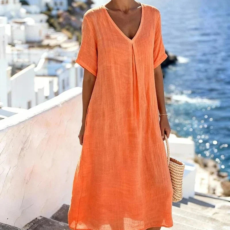 Navy women's V-neck midi dress, short sleeve, relaxed fit, perfect casual everyday summer dress.