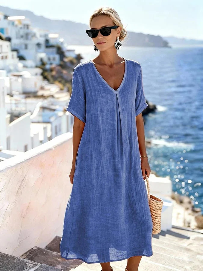 Stylish V-neck midi dress for women, relaxed fit, short sleeves, a comfortable casual spring essential.