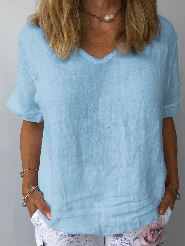 Comfortable women's relaxed fit V-neck short sleeve top, great for everyday casual style and summer fashion.