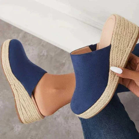 Women's retro chic wedge sandals, perfect for effortless everyday summer style.