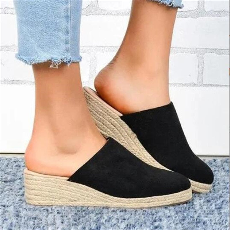 Comfortable women's wedge sandals with a fashionable retro design for daily wear.