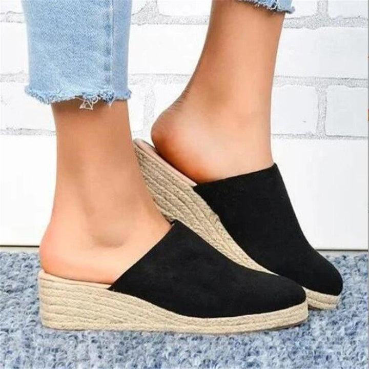 Comfortable women's wedge sandals with a fashionable retro design for daily wear.