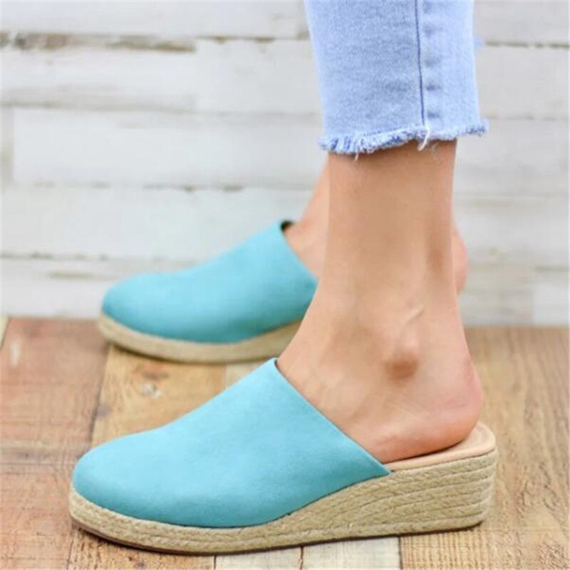 Slip-on retro wedge sandals for women, combining comfort and effortless style.