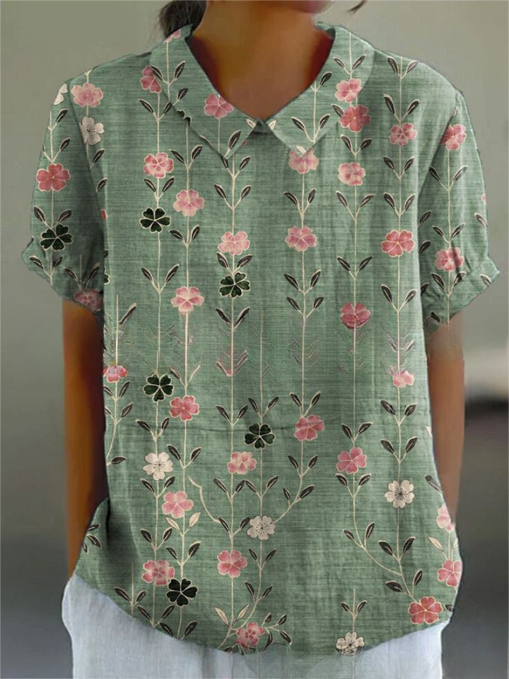 Stylish women's retro floral embroidered top, short sleeve blouse for elegant casual wear.