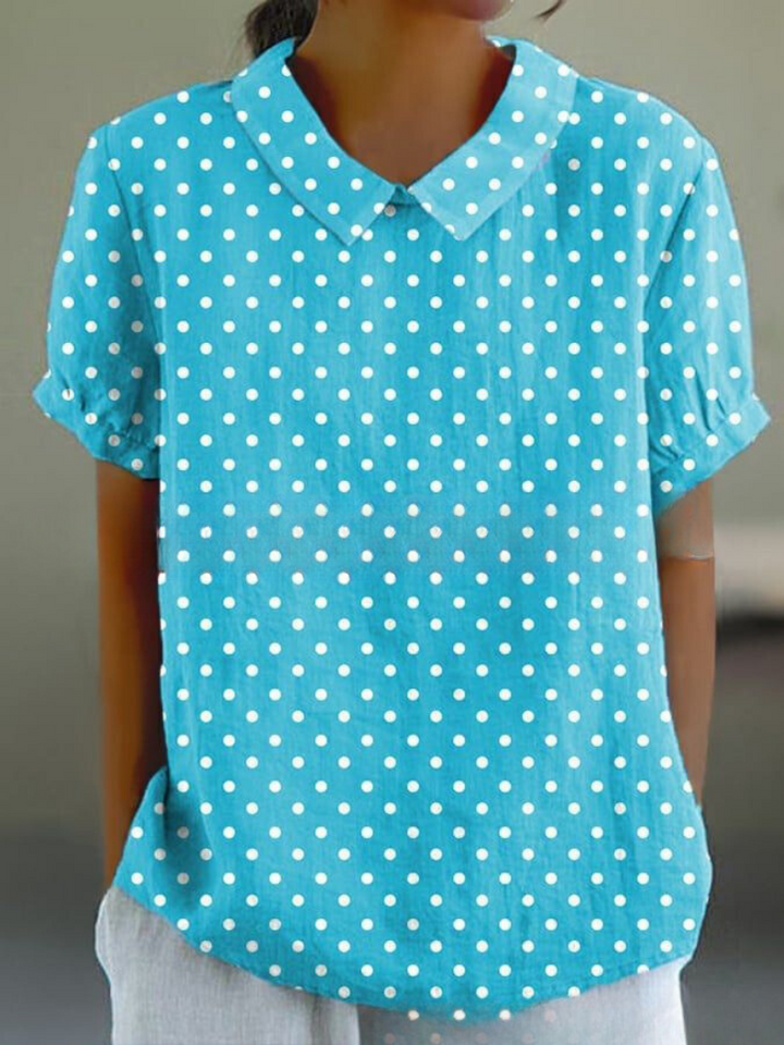 Breezy women's short sleeve top, retro floral embroidery, comfortable summer fashion.