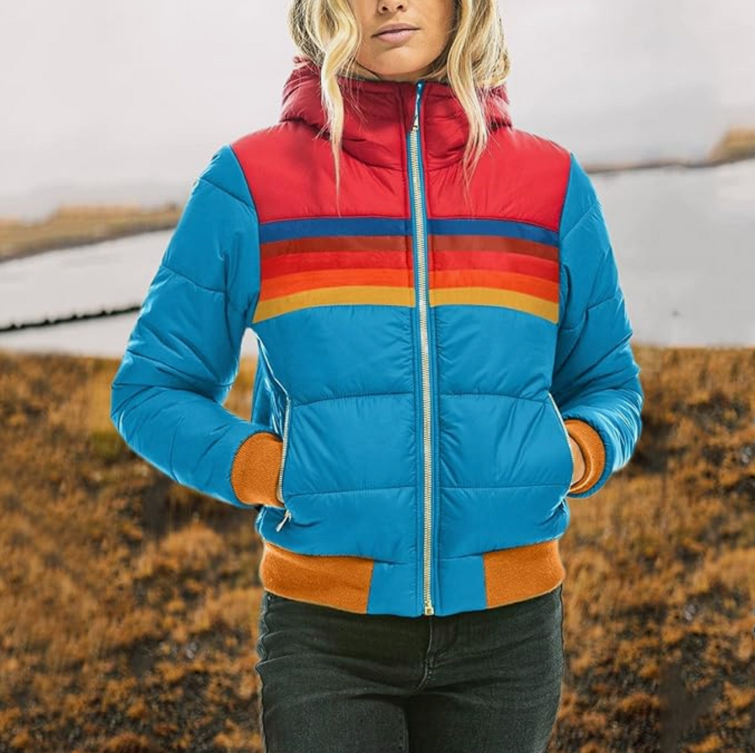 Ladies' warm retro winter parka, featuring a stylish faux fur hood. Ideal outerwear for women in cold weather.