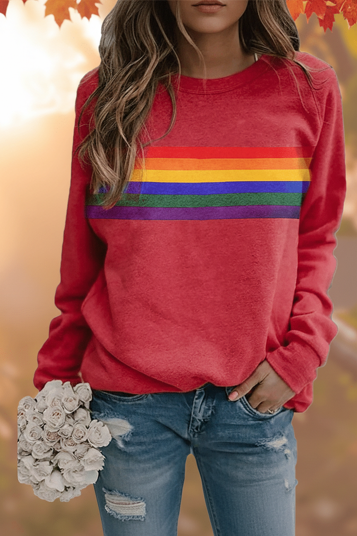 Women's retro rainbow striped sweatshirt, cozy comfort for casual wear.
