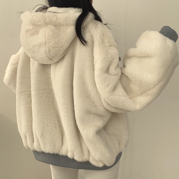 Warm & versatile women's reversible hooded jacket, ideal casual outerwear for fall and winter.